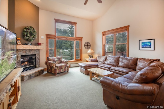 58 Hawk Cir Unit 2342, Dillon, CO 80435 - living room featuring baseboard heating, high vaulted ceiling, a fireplace, carpet flooring, and ceiling fan
