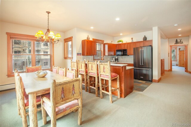 58 Hawk Cir Unit 2342, Dillon, CO 80435 - dining room with a chandelier, carpet, and sink