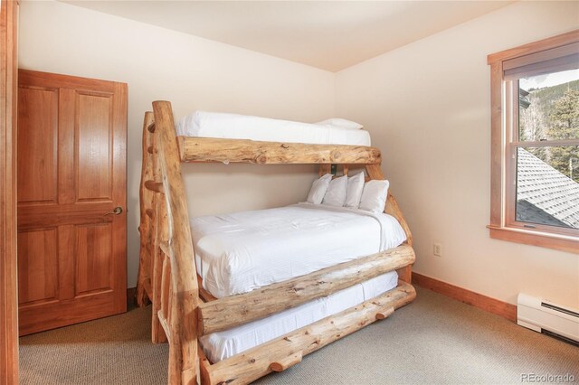 58 Hawk Cir Unit 2342, Dillon, CO 80435 - bedroom with carpet flooring and baseboard heating