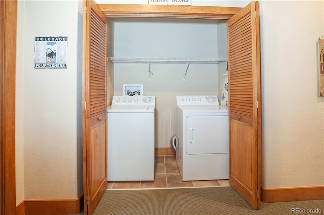 58 Hawk Cir Unit 2342, Dillon, CO 80435 - laundry area with washing machine and dryer, tile floors, and washer hookup