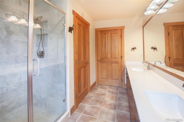 58 Hawk Cir Unit 2342, Dillon, CO 80435 - bathroom with a shower with shower door, tile floors, and double sink vanity