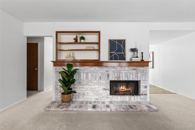 carpeted living area featuring a fireplace