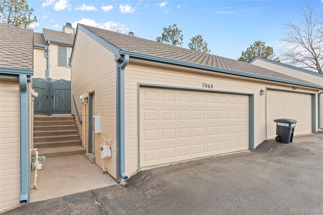 garage featuring a gate