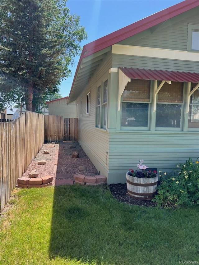 40 Bronk St, Monte Vista, CO 81144 - view of side of property with a fenced backyard