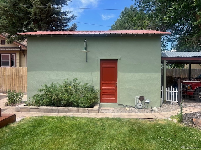 40 Bronk St, Monte Vista, CO 81144 - view of front facade with stucco siding and a metal roof