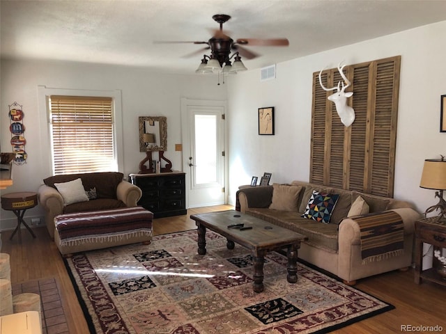 40 Bronk St, Monte Vista, CO 81144 - living area featuring a ceiling fan, wood finished floors, and healthy amount of natural light