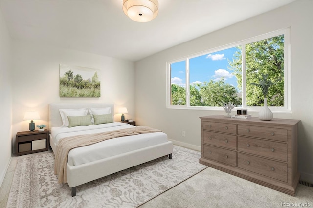 14544 March Dr, Denver, CO 80239 - bedroom with multiple windows and light colored carpet