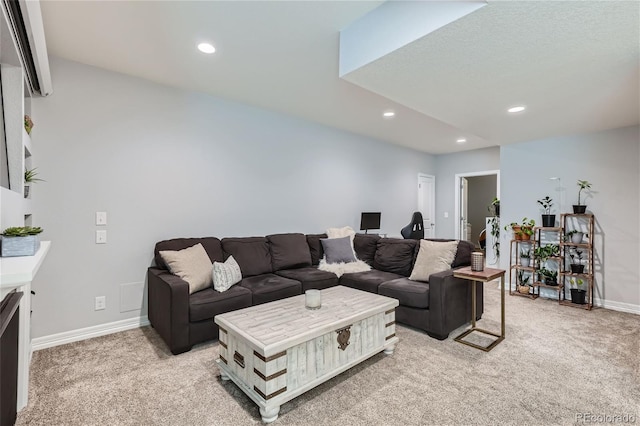 living room featuring light colored carpet