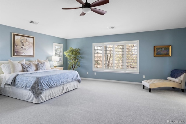 bedroom featuring visible vents, carpet flooring, a ceiling fan, and baseboards