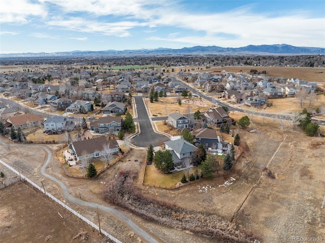 aerial view with a mountain view and a residential view