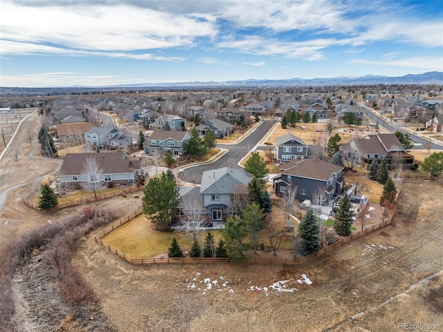 bird's eye view featuring a mountain view and a residential view