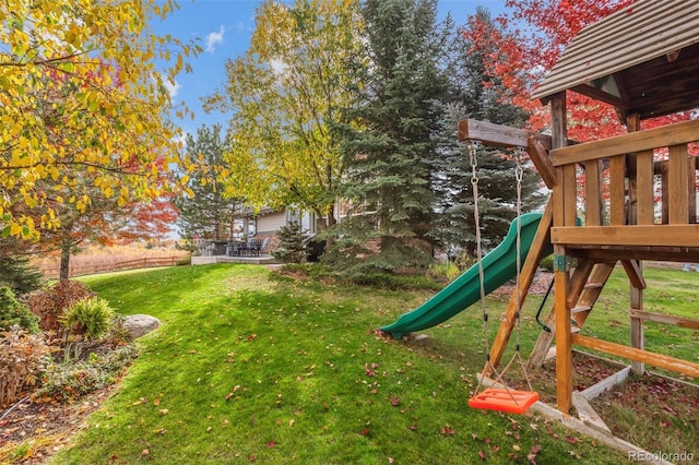 view of playground featuring a yard