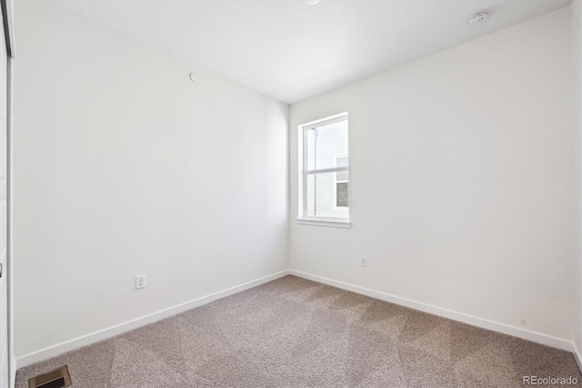 view of carpeted spare room