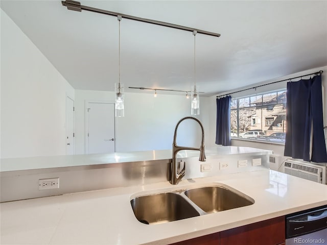 500 E 11th Ave Unit 203, Denver, CO 80203 - kitchen with dishwasher, light countertops, and hanging light fixtures