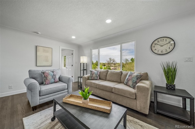 4640 W Ellsworth Ave, Denver, CO 80219 - living room featuring baseboards, a textured ceiling, recessed lighting, and wood finished floors