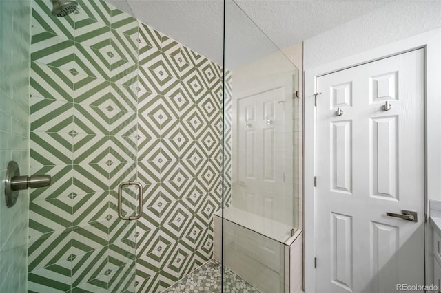 4640 W Ellsworth Ave, Denver, CO 80219 - full bath with a stall shower and a textured ceiling