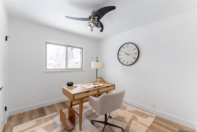 home office featuring ceiling fan and light wood-type flooring