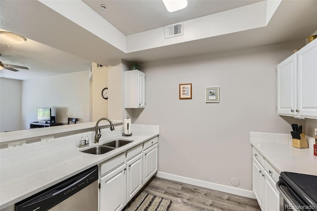 12818 Ironstone Way Unit 101, Parker, CO 80134 - kitchen featuring a sink, stainless steel appliances, ceiling fan, light wood-type flooring, and baseboards