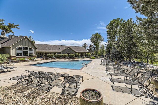 12818 Ironstone Way Unit 101, Parker, CO 80134 - community pool with a patio area