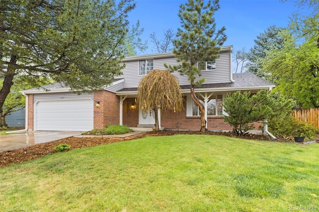 6602 S Vance St, Littleton, CO 80123 - traditional-style house featuring an attached garage, concrete driveway, and brick siding
