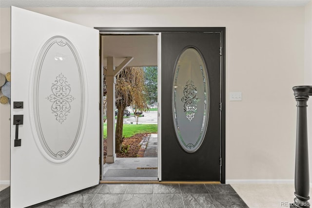 6602 S Vance St, Littleton, CO 80123 - entrance foyer with baseboards