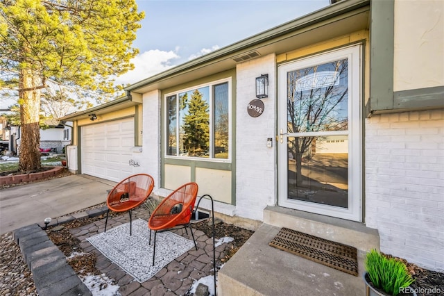 property entrance featuring a garage