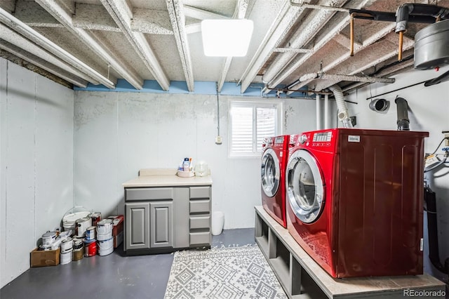 laundry area with separate washer and dryer