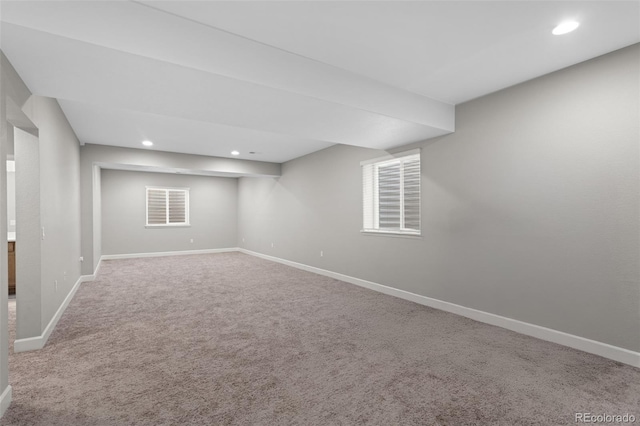 finished basement with carpet floors, recessed lighting, and baseboards