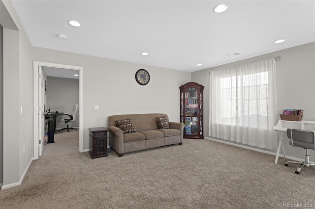 living area featuring recessed lighting, carpet, and baseboards