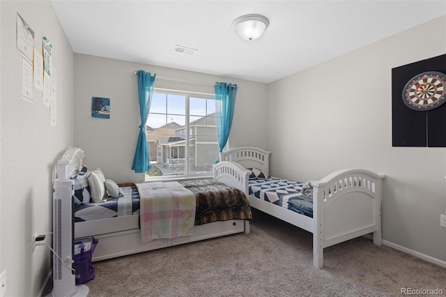 bedroom with carpet flooring and visible vents