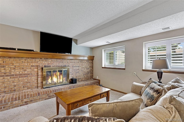 1982 S Truckee St, Aurora, CO 80013 - carpeted living room featuring a fireplace and a textured ceiling