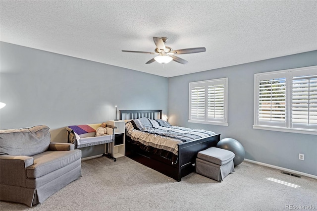 1982 S Truckee St, Aurora, CO 80013 - bedroom featuring carpet floors, a textured ceiling, and ceiling fan