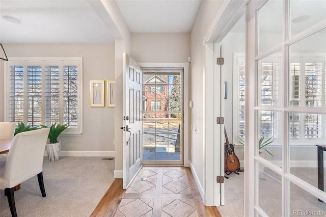 entrance foyer featuring baseboards