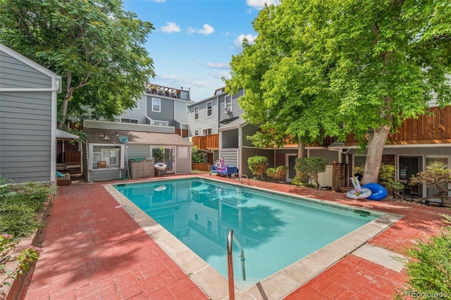 1111 Maxwell Ave Unit 228, Boulder, CO 80304 - swimming pool featuring an outbuilding and a patio area