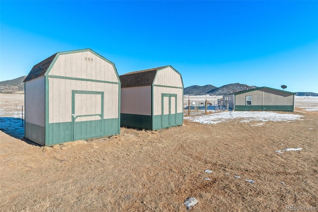 view of shed with a mountain view