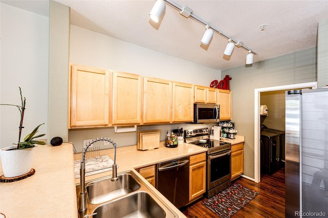452 Black Feather Loop Unit 608, Castle Rock, CO 80104 - kitchen featuring stainless steel appliances, a sink, light brown cabinets, light countertops, and dark wood-type flooring