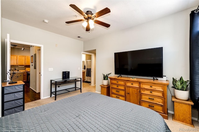 452 Black Feather Loop Unit 608, Castle Rock, CO 80104 - bedroom featuring light colored carpet, baseboards, and ceiling fan