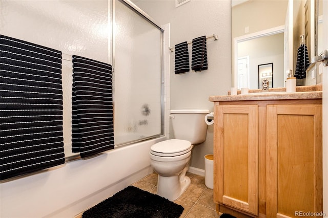 452 Black Feather Loop Unit 608, Castle Rock, CO 80104 - bathroom with tile patterned flooring, vanity, toilet, and shower / bath combination with glass door