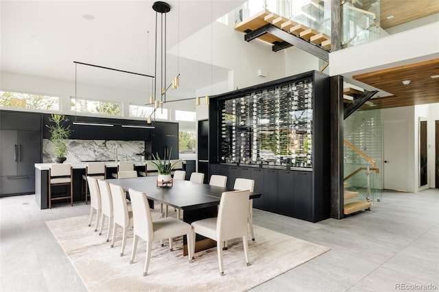 140 S Glencoe St, Denver, CO 80246 - dining space with a high ceiling and plenty of natural light