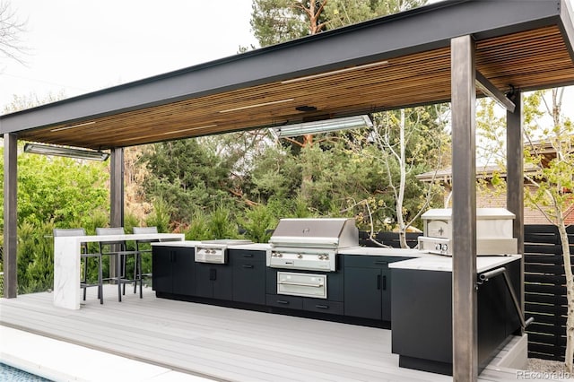 140 S Glencoe St, Denver, CO 80246 - wooden terrace featuring exterior kitchen