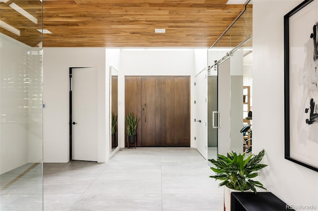 140 S Glencoe St, Denver, CO 80246 - foyer with wood ceiling and light tile patterned flooring
