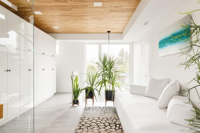 140 S Glencoe St, Denver, CO 80246 - sitting room with wooden ceiling and light tile patterned floors
