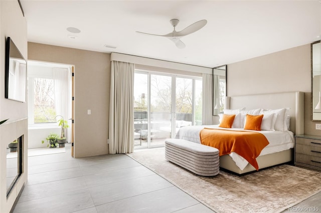 140 S Glencoe St, Denver, CO 80246 - bedroom with access to outside, a ceiling fan, and light tile patterned flooring