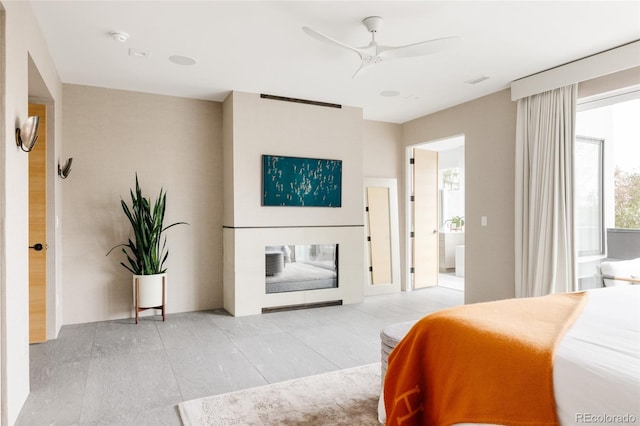 140 S Glencoe St, Denver, CO 80246 - bedroom featuring a glass covered fireplace and ceiling fan
