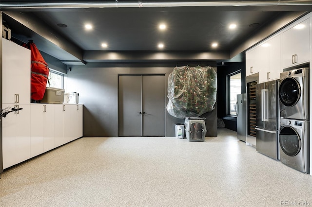 140 S Glencoe St, Denver, CO 80246 - laundry area with stacked washer / drying machine and recessed lighting