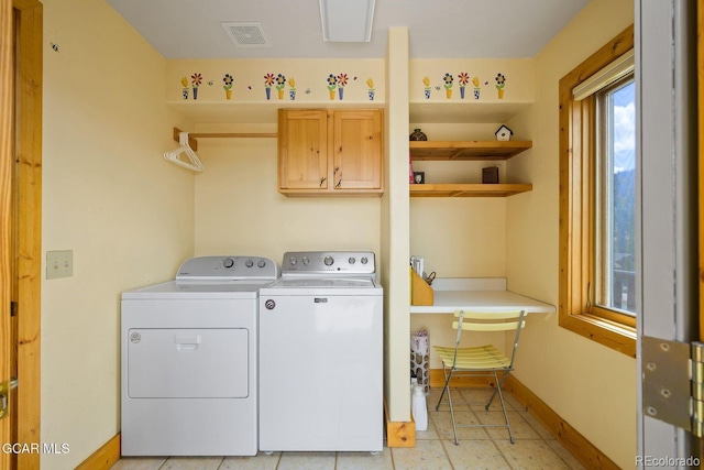 62 897, Grand Lake, CO 80447 - washroom with washing machine and clothes dryer and cabinet space