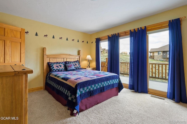 62 897, Grand Lake, CO 80447 - carpeted bedroom featuring access to exterior and baseboards