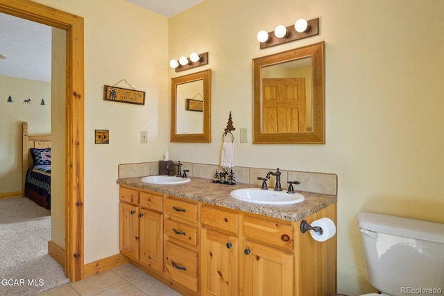 62 897, Grand Lake, CO 80447 - ensuite bathroom featuring double vanity and tile patterned flooring