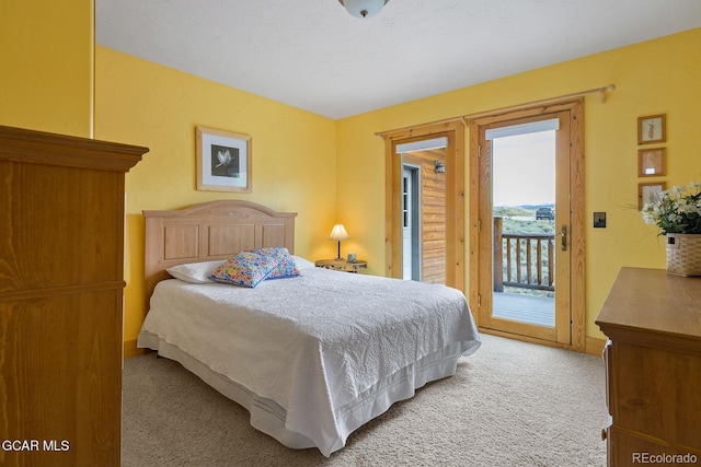 62 897, Grand Lake, CO 80447 - bedroom with light colored carpet and access to exterior