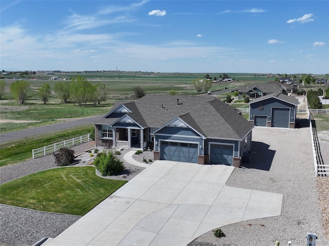 31353 E 163rd Ave, Hudson, CO 80642 - view of front of house with a garage, driveway, and brick siding